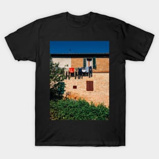 Laundry Drying on Washing Line Against Old Brick Building in Tuscany Italy T-Shirt